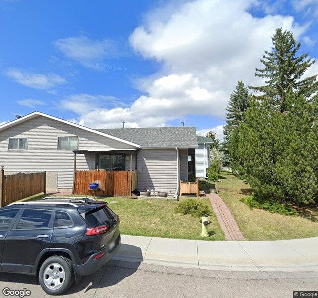Street view of 151 Millcrest Way SW, Calgary