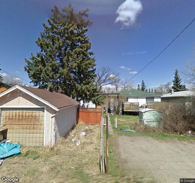 Street view of 1-1523 20 Avenue NW, Calgary