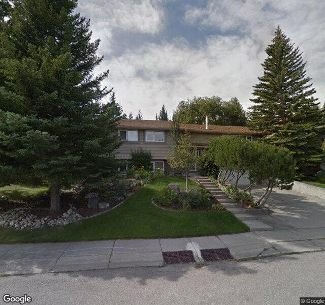 Street view of 136 Oakside Place SW, Calgary