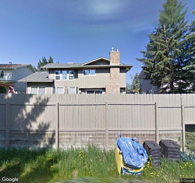 Street view of 12312 Lake Moraine Rise SE, Calgary