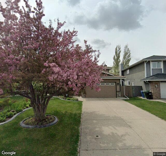 Street view of 216 Sunset Place SE, Calgary