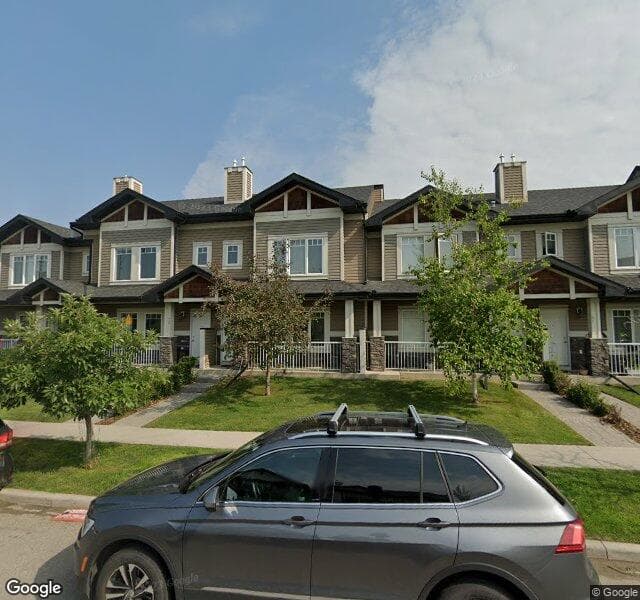 Street view of 75 Prestwick Villas SE, Calgary