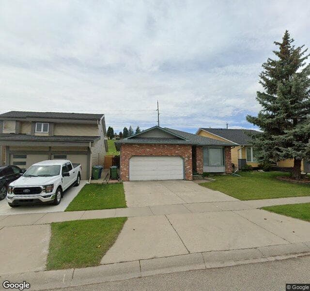 Street view of 13803 Deer Run Boulevard SE, Calgary