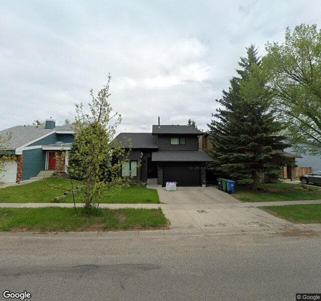 Street view of 14008 Deer Run Boulevard SE, Calgary