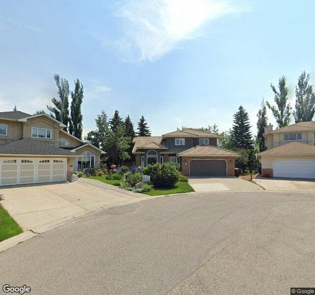 Street view of 115 Woodpark Terrace SW, Calgary