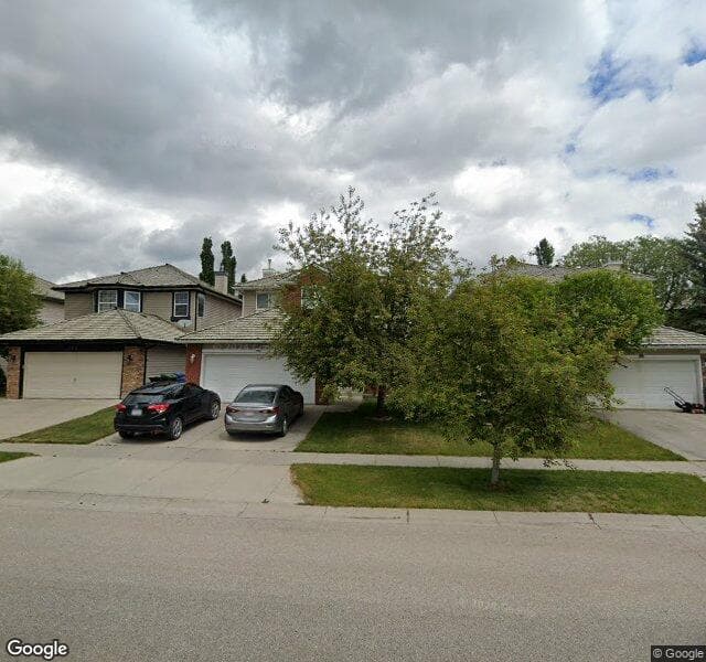 Street view of 266 Rocky Ridge Drive NW, Calgary
