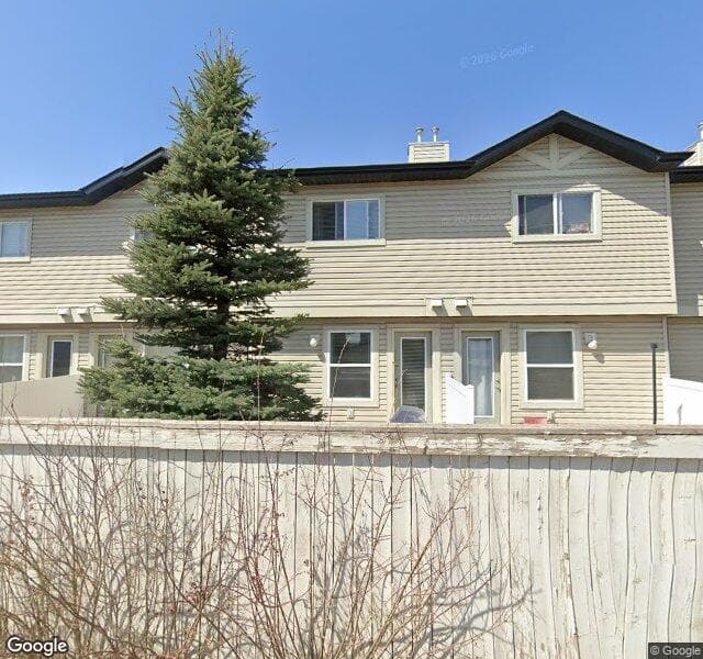 Street view of 233 Saddlebrook Point NE, Calgary