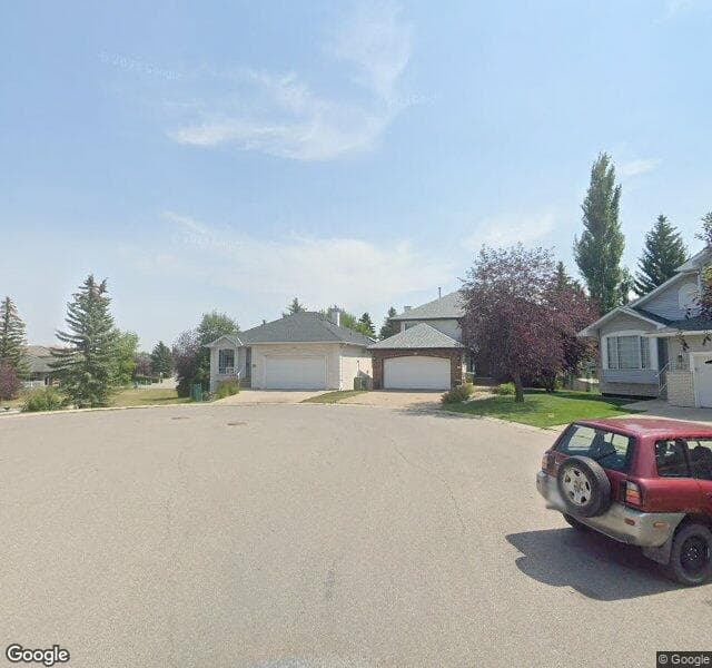 Street view of 339 Woodpark Green SW, Calgary