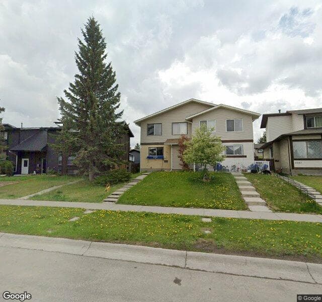 Street view of 11107 Oakfield Drive SW, Calgary