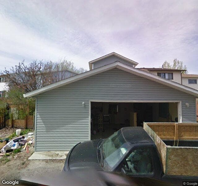 Street view of 232 Woodmont Court SW, Calgary