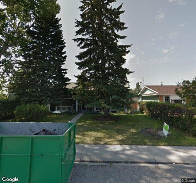 Street view of 23 Lake Patricia Place SE, Calgary