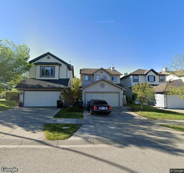 Street view of 1074 Tuscany Drive NW, Calgary