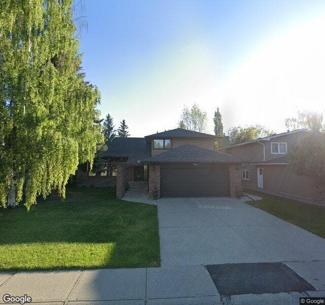 Street view of 127 Oakside Place SW, Calgary