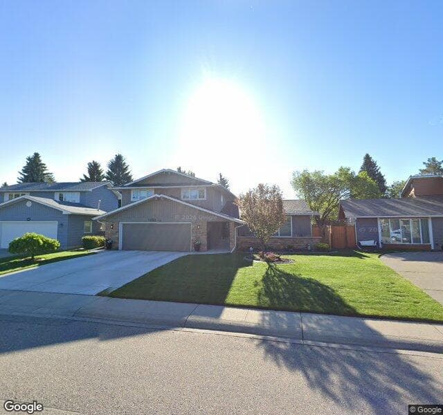 Street view of 12352 Lake Moraine Rise SE, Calgary