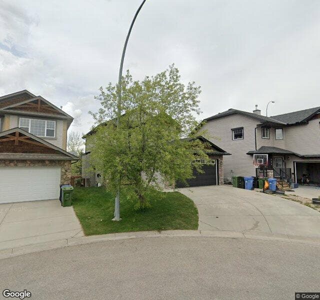 Street view of 153 Rockborough Green NW, Calgary