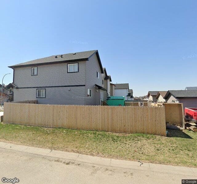 Street view of 213 Saddlecrest Close NE, Calgary