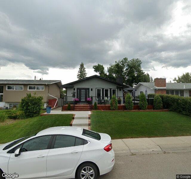 Street view of 1116 Lake Wapta Way SE, Calgary