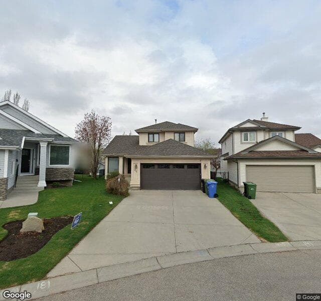 Street view of 218 Hidden Cove NW, Calgary