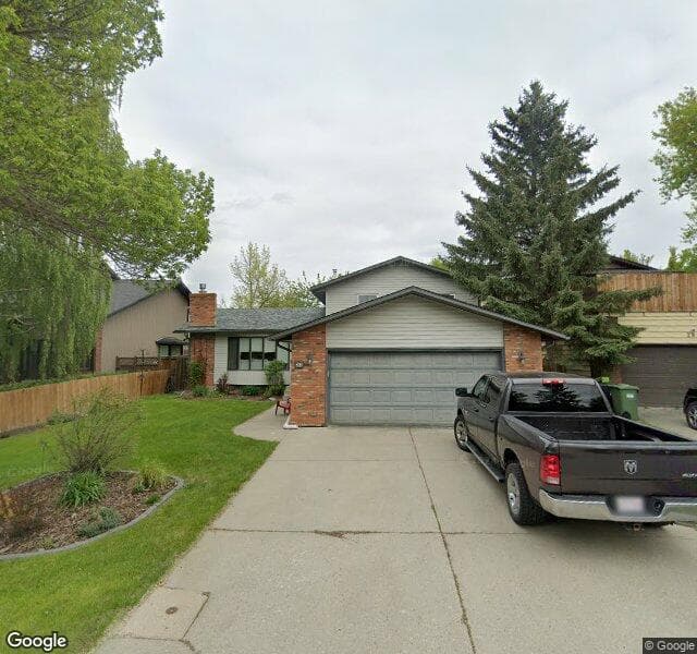 Street view of 32 Deercross Place SE, Calgary