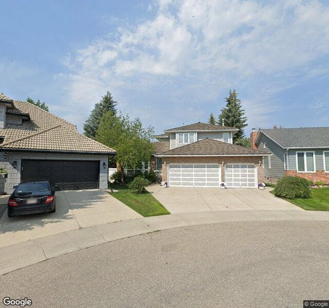 Street view of 229 Woodbriar Circle SW, Calgary
