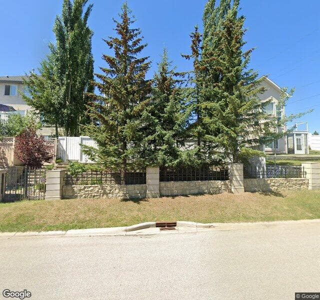 Street view of 100 Strathridge Close SW, Calgary