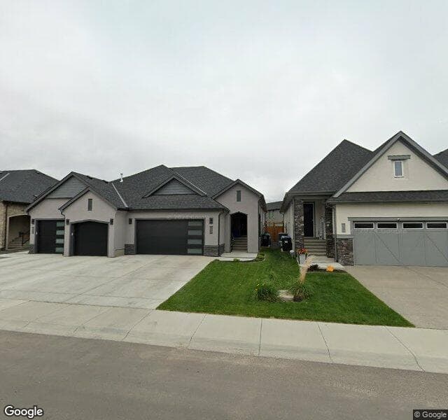 Street view of 33 Cranbrook Mews SE, Calgary