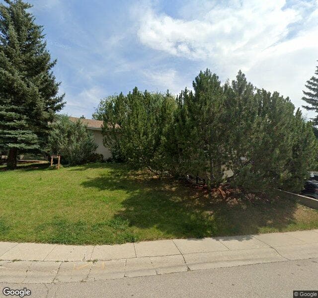 Street view of 132 Pump Hill Green SW, Calgary