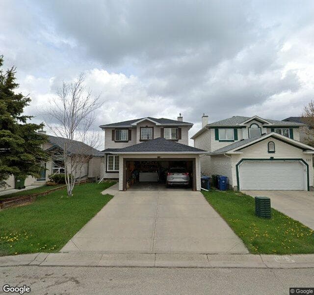 Street view of 129 Bridlecreek Park SW, Calgary