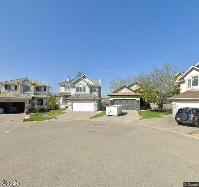 Street view of 311 Harvest Grove Place NE, Calgary