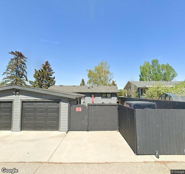 Street view of 7711 Hunterburn Hill NW, Calgary