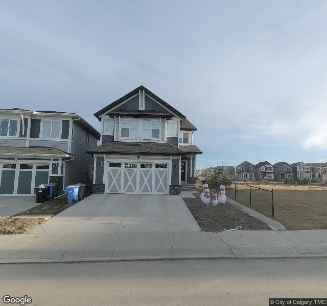 Street view of 57 Magnolia Manor SE, Calgary