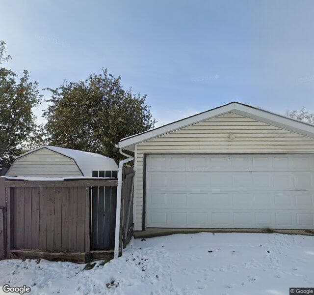 Street view of 48 Huntham Road NE, Calgary