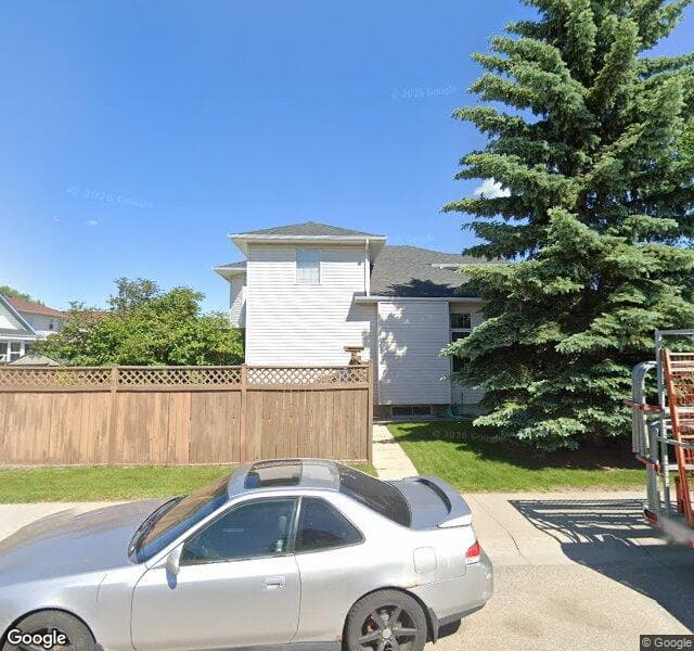 Street view of 301 Coral Springs Place NE, Calgary