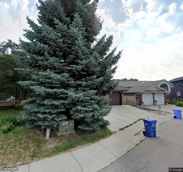 Street view of 75 Woodridge Close SW, Calgary
