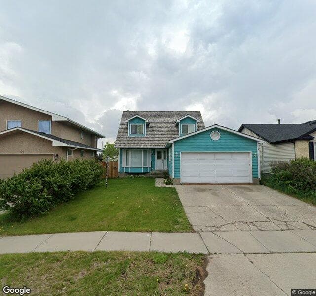 Street view of 43 Woodglen Rise SW, Calgary