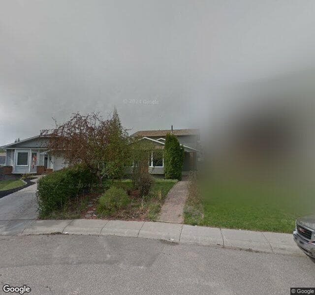 Street view of 59 Shawcliffe Green SW, Calgary