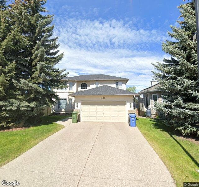 Street view of 406 Mount Sparrowhawk Place SE, Calgary