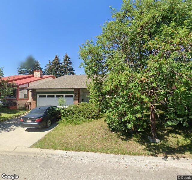 Street view of 51 Strathcona Close SW, Calgary