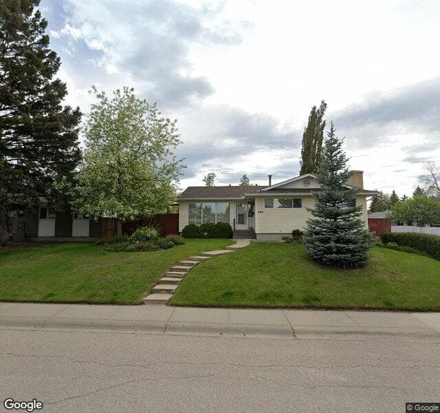 Street view of 228 Maple Court Crescent SE, Calgary