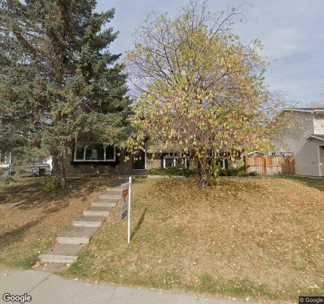Street view of 844 Lake Lucerne Drive SE, Calgary