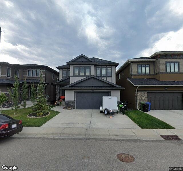Street view of 91 Aspen Summit View SW, Calgary
