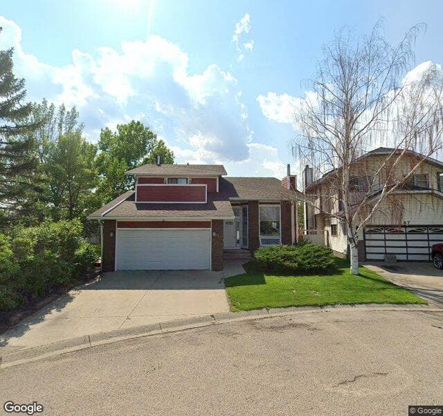 Street view of 91 Riverglen Way SE, Calgary