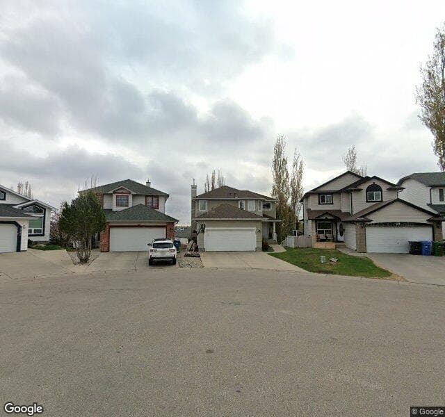 Street view of 315 Hidden Cove NW, Calgary