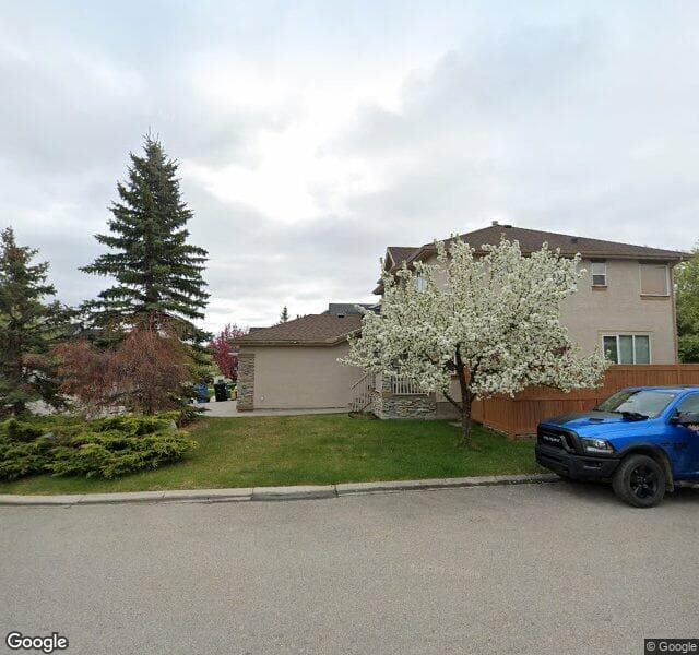 Street view of 235 Everwillow Close SW, Calgary