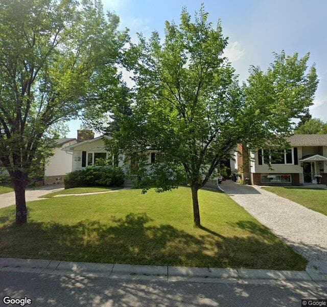 Street view of 711 Brookpark Drive SW, Calgary