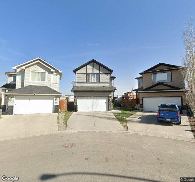 Street view of 224 Covecreek Court NE, Calgary