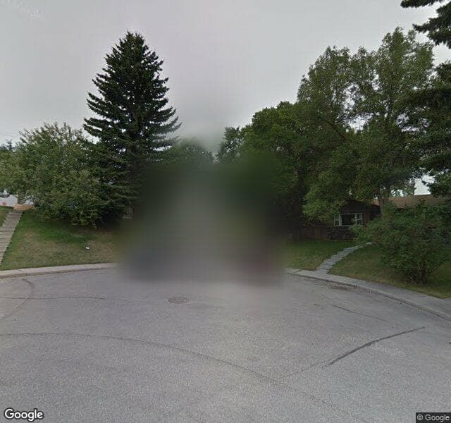 Street view of 18 Hutton Crescent SW, Calgary