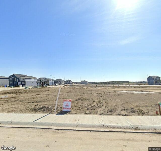 Street view of 152 Creekside Street SW, Calgary
