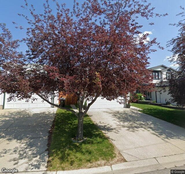 Street view of 66 River Rock Crescent SE, Calgary