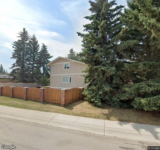 Street view of 103 Pump Hill Bay SW, Calgary